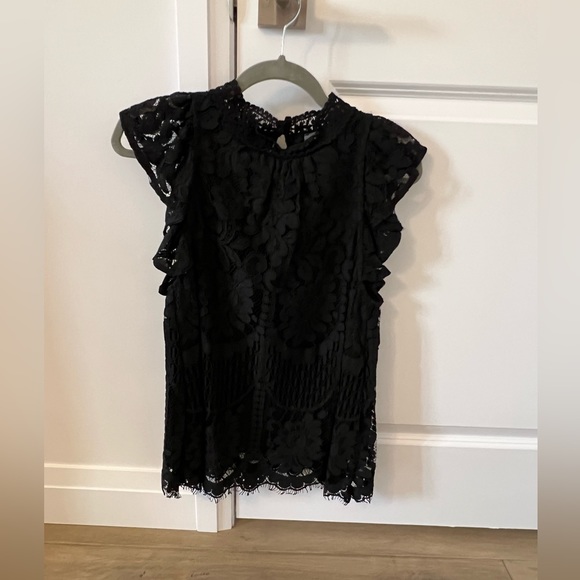 Black lace top with flutter sleeves. The main body part is fully lined. - Picture 1 of 2